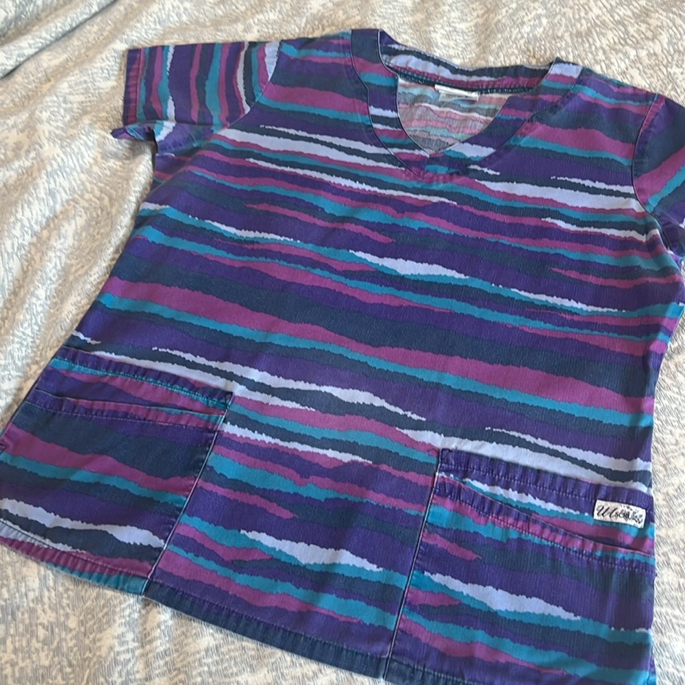 UA scrubs women’s scrub top. Size medium.